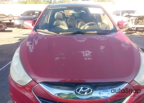 2010 Hyundai Tucson Limited z USA, uszkodzony, nr VIN KM8JUCAC9AU024189